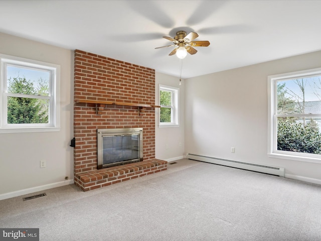 449 Fairview Cir, Woodstock, VA 22664 - unfurnished living room with a baseboard heating unit, carpet flooring, a fireplace, and ceiling fan