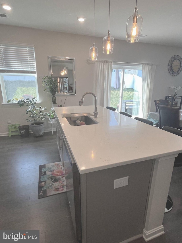 5740 Stone School Ln, Frederick, MD 21704 - kitchen featuring recessed lighting, an island with sink, dark wood finished floors, pendant lighting, and a sink