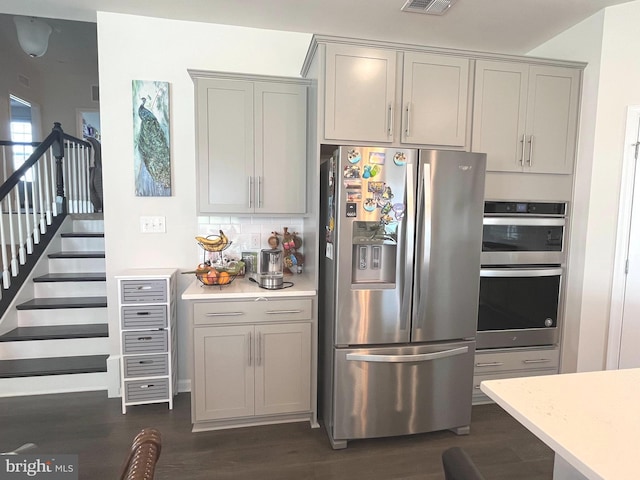 5740 Stone School Ln, Frederick, MD 21704 - kitchen featuring gray cabinetry, light countertops, and appliances with stainless steel finishes