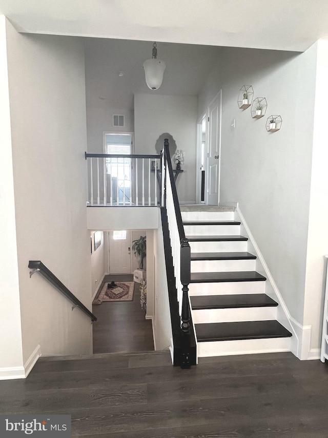 5740 Stone School Ln, Frederick, MD 21704 - staircase featuring visible vents, baseboards, and wood finished floors
