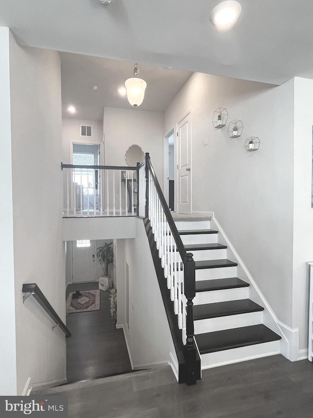 5740 Stone School Ln, Frederick, MD 21704 - stairway with visible vents, baseboards, and wood finished floors