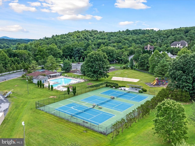 aerial view with a wooded view