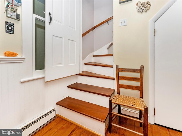 36 Fulton Ave, Walkersville, MD 21793 - stairs with wood finished floors and a baseboard radiator