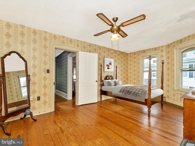 36 Fulton Ave, Walkersville, MD 21793 - bedroom with wallpapered walls, light wood-type flooring, baseboards, and a ceiling fan
