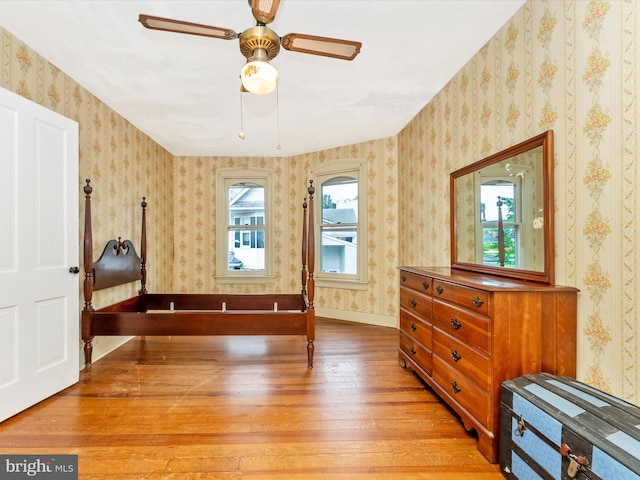 36 Fulton Ave, Walkersville, MD 21793 - bedroom with light wood-style flooring, baseboards, wallpapered walls, and multiple windows