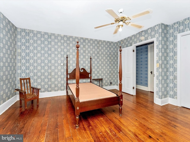 36 Fulton Ave, Walkersville, MD 21793 - bedroom featuring baseboards, visible vents, wood-type flooring, and wallpapered walls