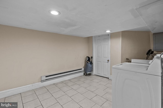 laundry room with laundry area, baseboard heating, recessed lighting, washing machine and clothes dryer, and light tile patterned flooring