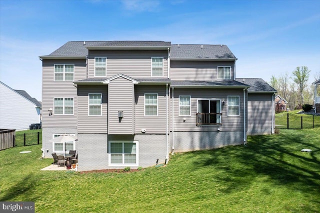 1230 Fairwood Dr, Huntingtown, MD 20639 - rear view of property with a yard, a patio, fence, and brick siding