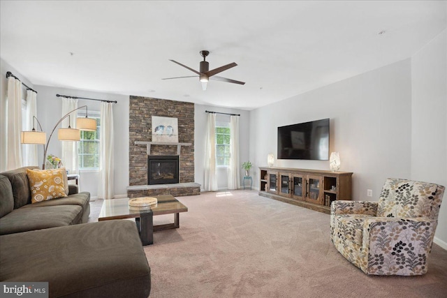 1230 Fairwood Dr, Huntingtown, MD 20639 - living area featuring carpet floors, ceiling fan, a fireplace, and baseboards