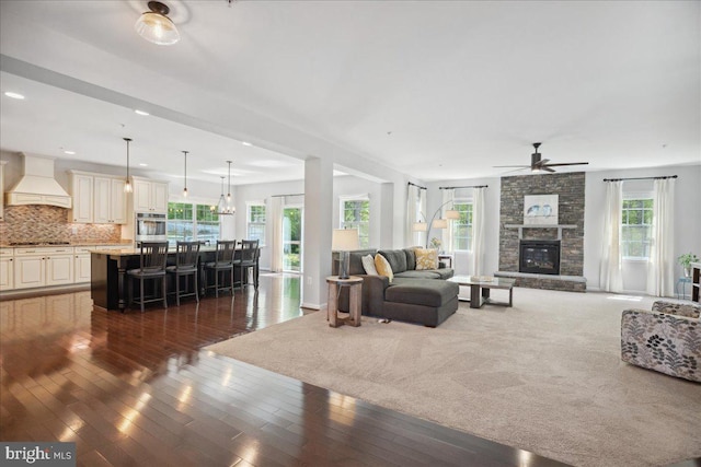 1230 Fairwood Dr, Huntingtown, MD 20639 - living area featuring recessed lighting, dark wood finished floors, ceiling fan, and a fireplace