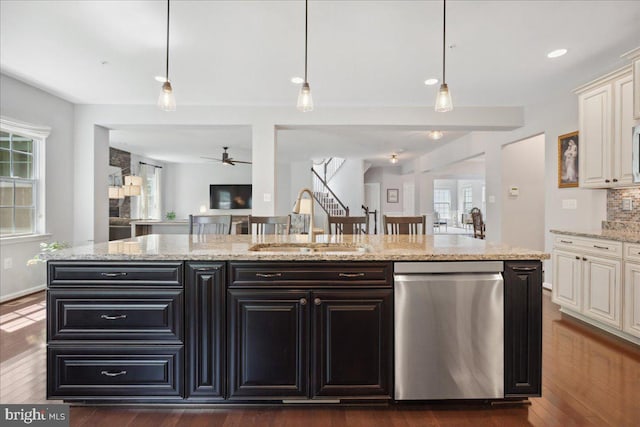 1230 Fairwood Dr, Huntingtown, MD 20639 - kitchen featuring a sink, ceiling fan, dishwasher, and a healthy amount of sunlight