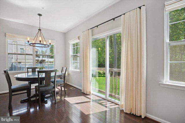 1230 Fairwood Dr, Huntingtown, MD 20639 - dining space featuring visible vents, an inviting chandelier, baseboards, dark wood-type flooring, and vaulted ceiling