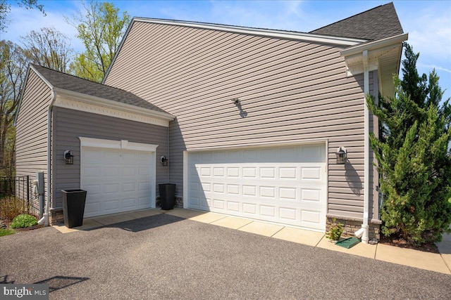 1230 Fairwood Dr, Huntingtown, MD 20639 - garage featuring driveway