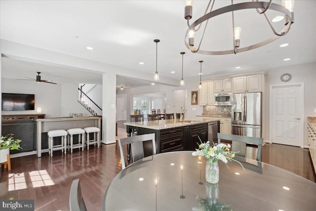 1230 Fairwood Dr, Huntingtown, MD 20639 - dining space with recessed lighting, a ceiling fan, and dark wood finished floors
