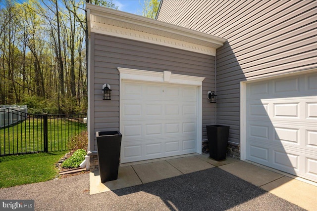 1230 Fairwood Dr, Huntingtown, MD 20639 - garage with fence