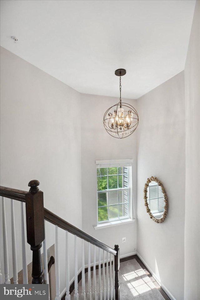 1230 Fairwood Dr, Huntingtown, MD 20639 - stairway with baseboards, carpet floors, and a chandelier