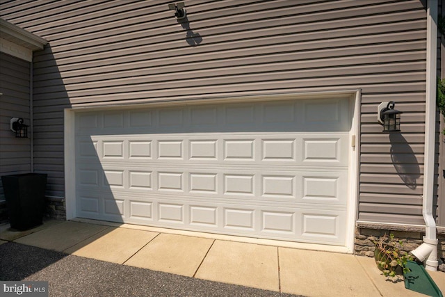 1230 Fairwood Dr, Huntingtown, MD 20639 - garage featuring concrete driveway