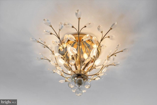 1230 Fairwood Dr, Huntingtown, MD 20639 - room details with a notable chandelier