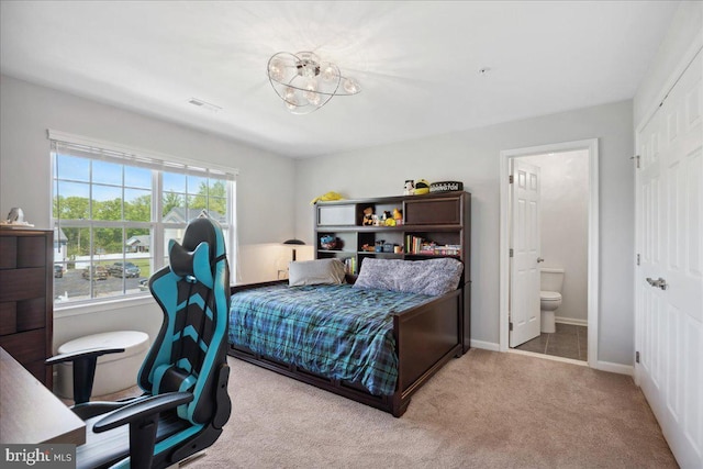 1230 Fairwood Dr, Huntingtown, MD 20639 - carpeted bedroom featuring baseboards, visible vents, connected bathroom, and a chandelier