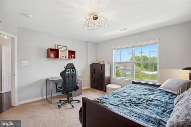 1230 Fairwood Dr, Huntingtown, MD 20639 - carpeted bedroom featuring baseboards, a notable chandelier, and visible vents