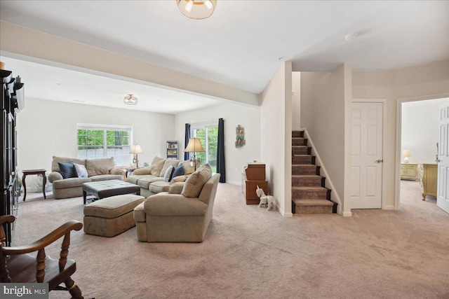 1230 Fairwood Dr, Huntingtown, MD 20639 - carpeted living area featuring stairway
