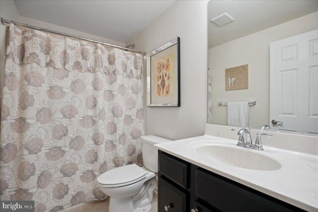 1230 Fairwood Dr, Huntingtown, MD 20639 - full bathroom with vanity, toilet, and visible vents