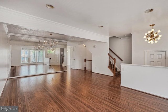 9403 Robin Lee Ct, Manassas Park, VA 20111 - unfurnished living room with a chandelier, crown molding, wood finished floors, stairs, and baseboards