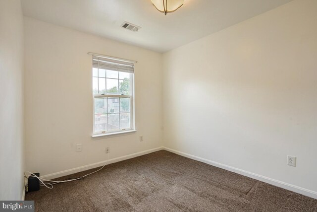 9403 Robin Lee Ct, Manassas Park, VA 20111 - empty room with carpet flooring and baseboards