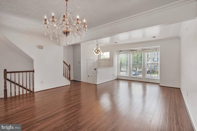 9403 Robin Lee Ct, Manassas Park, VA 20111 - unfurnished living room featuring a chandelier, wood finished floors, baseboards, ornamental molding, and stairs