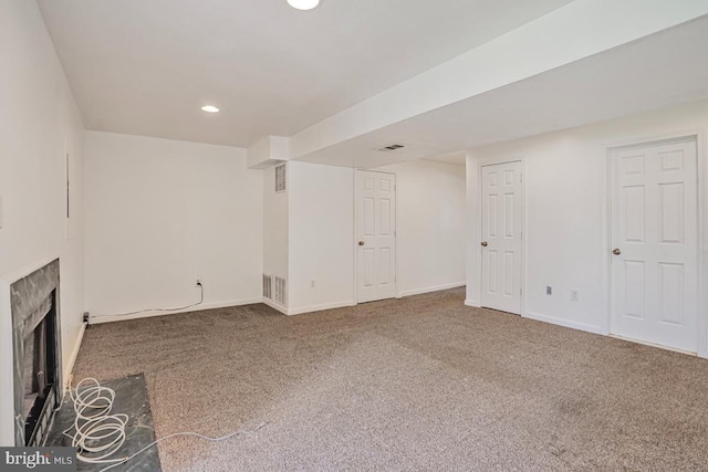 9403 Robin Lee Ct, Manassas Park, VA 20111 - unfurnished living room featuring carpet, a premium fireplace, recessed lighting, and baseboards