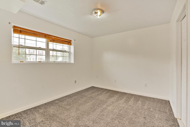 9403 Robin Lee Ct, Manassas Park, VA 20111 - spare room featuring carpet flooring and baseboards