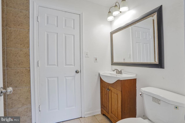 9403 Robin Lee Ct, Manassas Park, VA 20111 - half bath featuring vanity, tile patterned flooring, and toilet