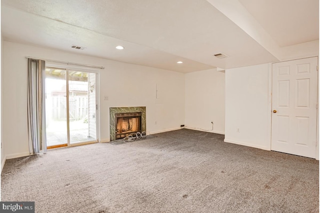 9403 Robin Lee Ct, Manassas Park, VA 20111 - unfurnished living room with carpet, a high end fireplace, baseboards, and recessed lighting