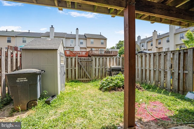 9403 Robin Lee Ct, Manassas Park, VA 20111 - view of yard with a residential view, a storage unit, and an outdoor structure