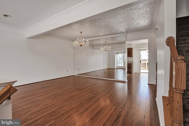 9403 Robin Lee Ct, Manassas Park, VA 20111 - unfurnished living room with dark wood-style floors, a chandelier, and ornamental molding