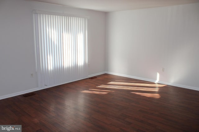 17 Rozina Ct, Owings Mills, MD 21117 - unfurnished room with visible vents, baseboards, and wood finished floors