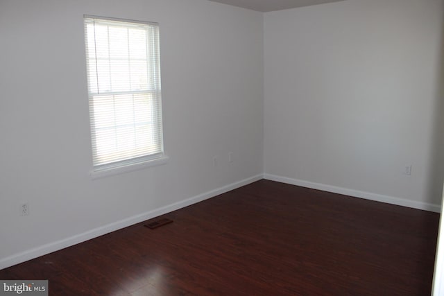 17 Rozina Ct, Owings Mills, MD 21117 - unfurnished room with wood finished floors, baseboards, and visible vents