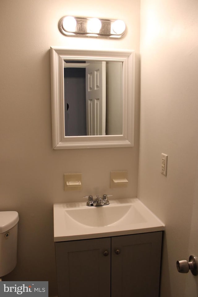 17 Rozina Ct, Owings Mills, MD 21117 - half bath featuring toilet and vanity