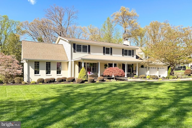 6704 Emporia Ct, Springfield, VA 22152 - view of front facade featuring a porch, a front yard, a chimney, an attached garage, and roof with shingles