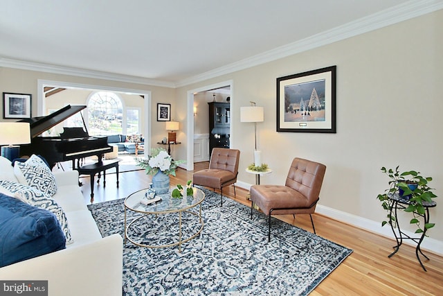 6704 Emporia Ct, Springfield, VA 22152 - living room with ornamental molding, wood finished floors, and baseboards