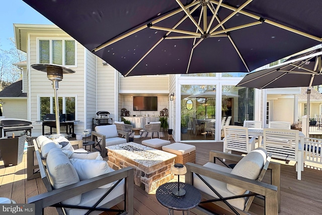 6704 Emporia Ct, Springfield, VA 22152 - wooden terrace with an outdoor living space with a fire pit