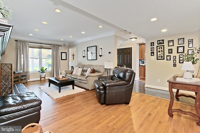 6704 Emporia Ct, Springfield, VA 22152 - living area featuring light wood-type flooring, baseboards, crown molding, and recessed lighting