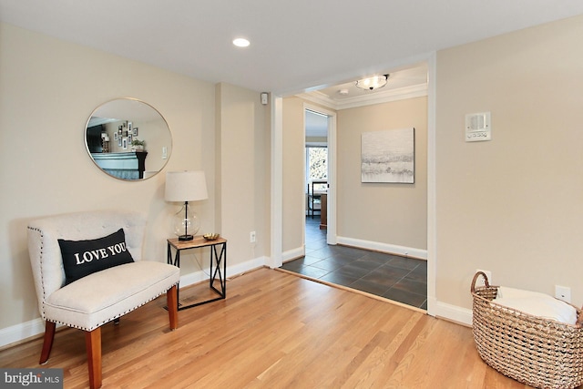 6704 Emporia Ct, Springfield, VA 22152 - living area with wood finished floors, baseboards, crown molding, and recessed lighting