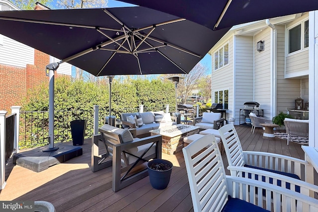 6704 Emporia Ct, Springfield, VA 22152 - wooden terrace featuring an outdoor living space with a fire pit