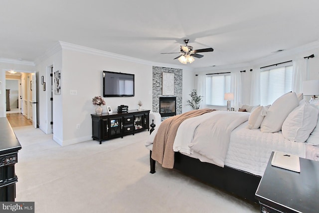 6704 Emporia Ct, Springfield, VA 22152 - bedroom featuring ornamental molding, baseboards, light carpet, a large fireplace, and a ceiling fan