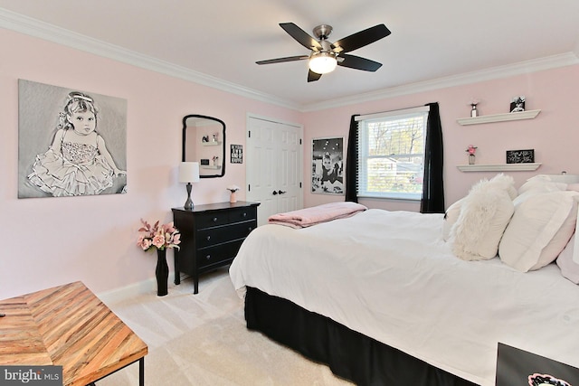 6704 Emporia Ct, Springfield, VA 22152 - bedroom with crown molding, light carpet, baseboards, a closet, and ceiling fan