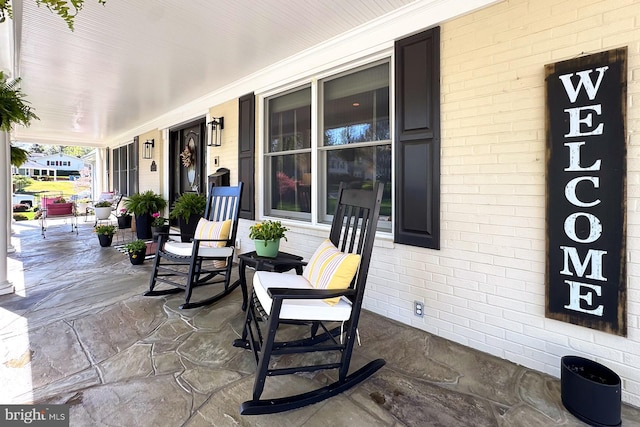 6704 Emporia Ct, Springfield, VA 22152 - view of patio / terrace with a porch