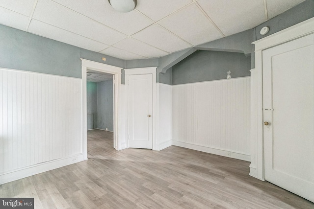 3905 L St, Philadelphia, PA 19124 - basement featuring a paneled ceiling, wainscoting, and wood finished floors
