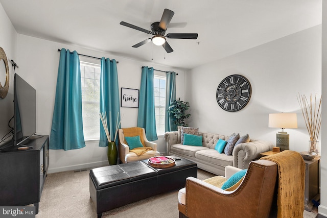 7204 Wood Trail Dr, Lanham, MD 20706 - living area with visible vents, baseboards, a ceiling fan, and carpet flooring