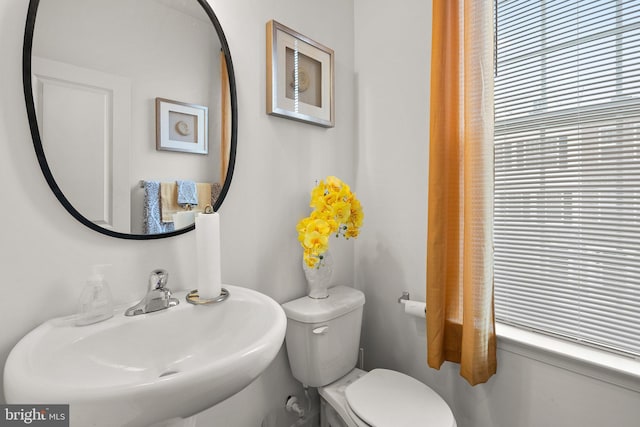 7204 Wood Trail Dr, Lanham, MD 20706 - half bathroom featuring a sink and toilet
